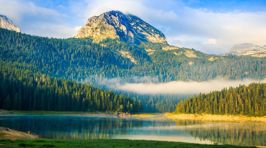 Mountain peak against the golden sunlight in Zabljak, Montenegro. Shant Dem@Unsplash