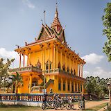 Yellow temple in Mekong, Phnom, Penh, Cambodia. Grasshopper Active Tours