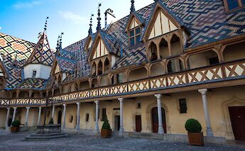 Ornate roof, Beaune, France. Flickr:Allan Harris