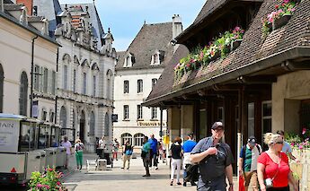 People walking through Beaune, France. Unsplash:Amin Zabardast