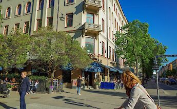 Cyclist passing by in Sodermalm, Stockholm, Sweden. Flickr: Chas B