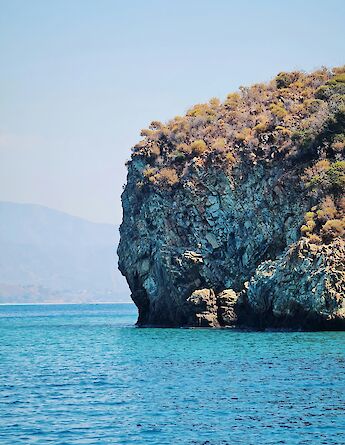 Cliff face in Fethiye, Turkey. Unsplash:Fehmi Saldanli