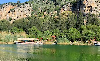 Green waters around King's Rock Tombs, Dalyan, Turkey. Unsplash:Deniz Vatan