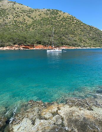 Yacht in the ocean, Fethiye, Turkey. Unsplash:Olga Pro