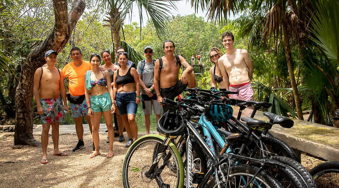 Posing behind the bikes, Tulum, Mexico. CC:Mexico Kan Tours