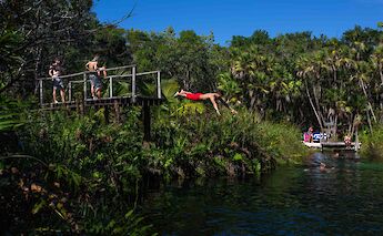 Bellyflopping into a cenote, Tulum, Mexico. CC:Mexico Kan Tours