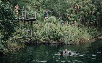 Plunging into a cenote, Tulum, Mexico. CC:Mexico Kan Tours