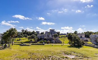 Ruins from afar, Tulum, Mexico. CC:Mexico Kan Tours