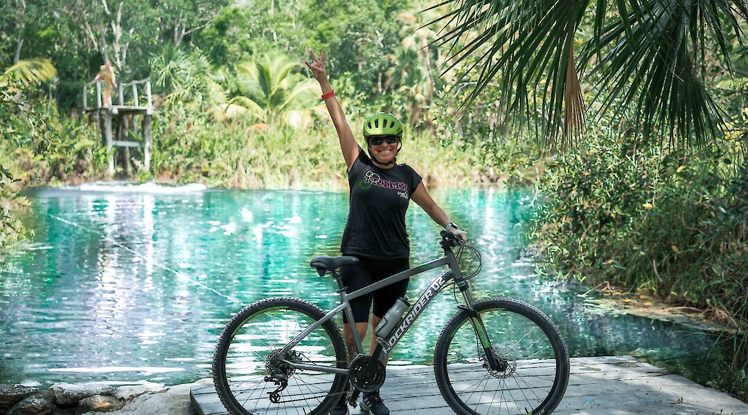 Arriving by bike at a cenote, Tulum, Mexico. CC:Mexico Kan Tours
