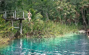 Launching into a cenote, Tulum, Mexico. CC:Mexico Kan Tours