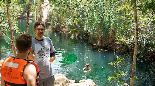 Talking to the tour guide at a cenote, Tulum, Mexico. CC:Mexico Kan Tours