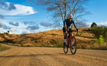 Gravel biking in the sunshine. Getty Images@Unsplash