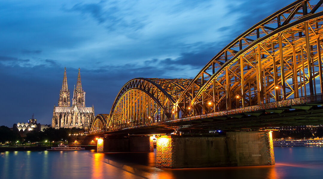 Cologne Cathedral & Hohenzollern Bridge over the Rhine River in Cologne, Germany. Anja Pietsch@Flickr