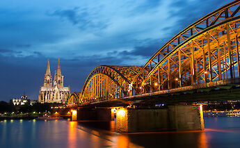 Cologne Cathedral & Hohenzollern Bridge over the Rhine River in Cologne, Germany. Anja Pietsch@Flickr