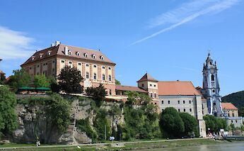 Buildings by the river in Wachau, Austria. Unsplash:Monika Fuchs