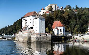 White buildings with red roofs in Passau, Germany. Unsplash:Wolfgang Weiser