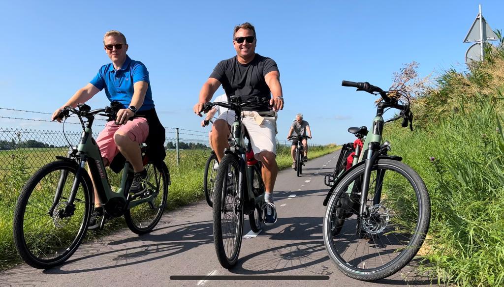 Cycling past the camera, Amsterdam countryside bike tour, Holland. CC:TO