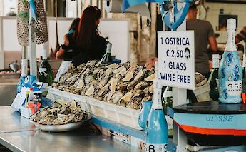 Oysters in Ortigia, Sicily. Unsplash: Dagnika Berzina