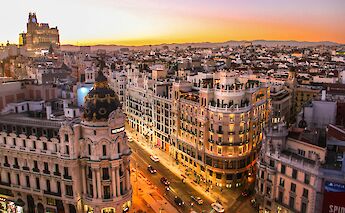 Sunset view of Gran Via in Madrid, Spain. FlorianWehde@Unsplash