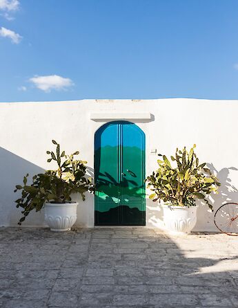 Beautiful painted doors in Ostuni. -to