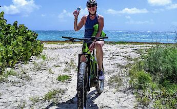 Biking on the beach, Barbados. CC:El Sol Vida