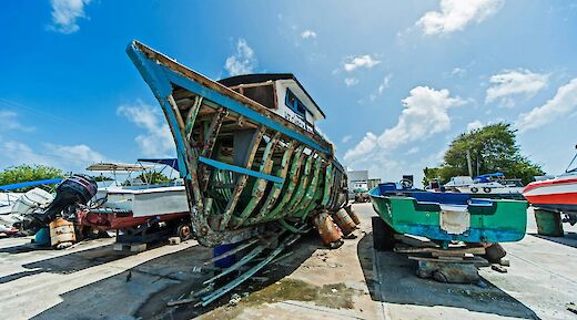 Boat in Oistins, Barbados. Tom Jur@Unsplash