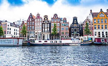 A beautiful canal in Amsterdam, Holland. Tobias Kordt@Unsplash
