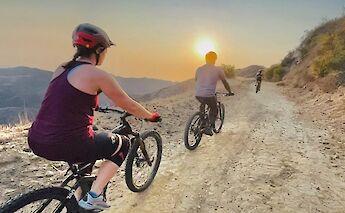 Following the group along the Backbone Trail at sunset, Malibu, California, USA. CC:LifeRush Adventures
