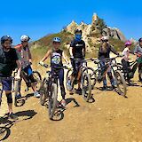 Group photo in front of a rocky outcrop, Malibu, California, USA. CC:LifeRush Adventures