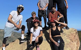 Group photo on top of a rock, Malibu, California, USA. CC:LifeRush Adventures