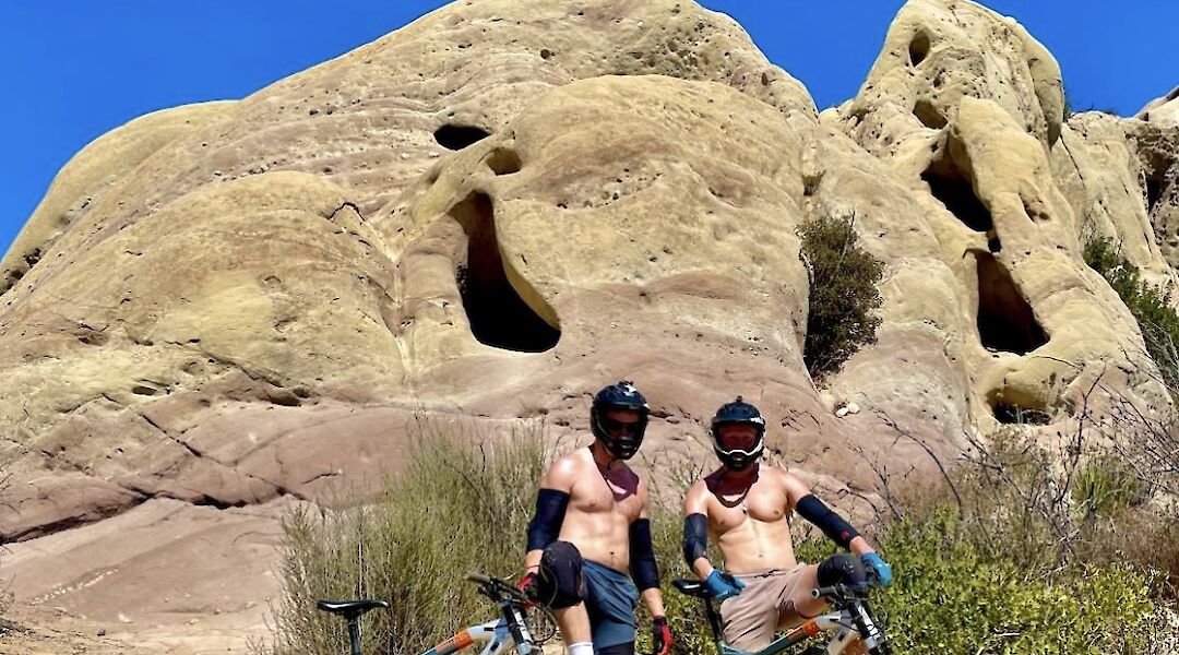 Posing with the bikes in front of a butte, Malibu, California, USA. CC:LifeRush Adventures