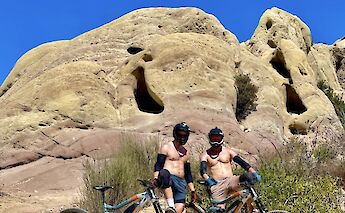 Posing with the bikes in front of a butte, Malibu, California, USA. CC:LifeRush Adventures