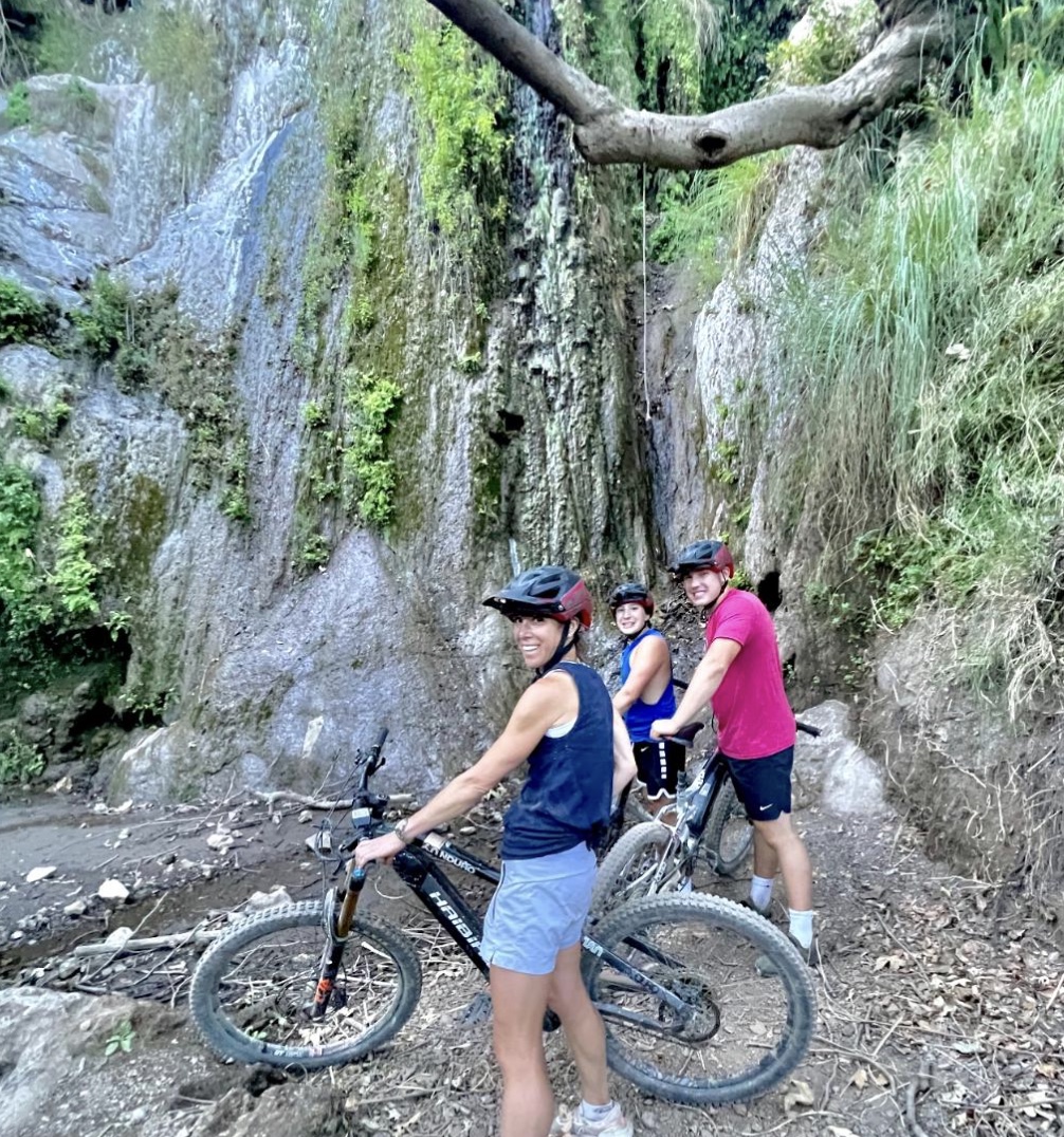 Posing with the bikes at the waterfall, Malibu, California, USA. CC:LifeRush Adventures