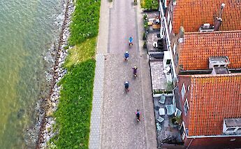 Cycling along the water in Volendam. toBBT