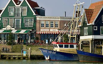 The heart of Volendam is its charming harbor, filled with traditional fishing boats. VitaliiKyktov@unsplash
