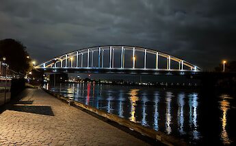 Iconic John Frost WWII bridge in Deventer, illuminated over the Ijssel River. ©Jan