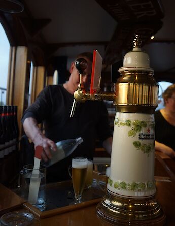 Enjoy a drink on the boat after a day of cycling. to-BBT