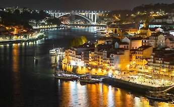 Porto at night, Portugal bike tours. Nicolas Ruiz@Unsplash