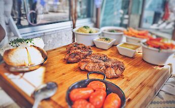 Steak and tomatoes, Portugal bike tours. Kaysha@Unsplash