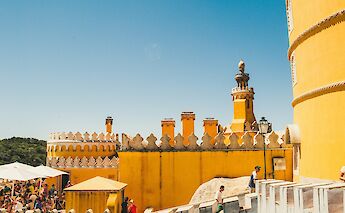 Yellow castle in Sintra, Portugal bike tours. Tania Mousinho@Unsplash