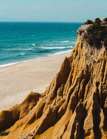 Cliffs in Alentejo, Portugal bike tours. Miguel Bernardo@Unsplash