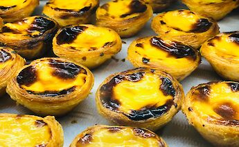 Fresh pasteis de nata, Portugal bike tours. Alice Butenko@Unsplash