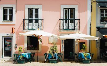Outdoor dining in Lisbon, Portugal bike tours. Clifford@Unsplash