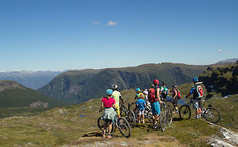 Bike tour group admiring the view, Voss, Norway. CC:Outdoor Norway
