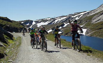 Biking along a fjord, Voss, Norway. CC:Outdoor Norway