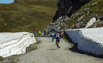 Cycling past icebanks, Voss, Norway. CC:Outdoor Norway