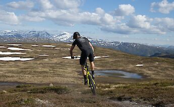 Tackling the Grand Traverse MTB trail, Voss, Norway. CC:Outdoor Norway