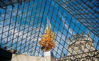Inside the Louvre pyramid, Paris, France. Jonathan Velasquez@Unsplash