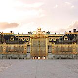 Gates of Versailles at dusk, Paris, France. Jessica Kantak Bailey@Unsplash