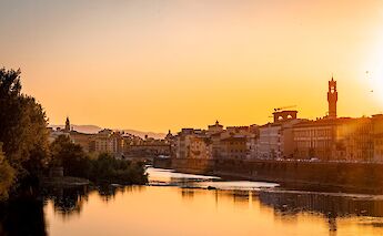 Sun setting over the river in Florence, Italy. CC:TO